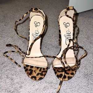 Cross Cross lace up leopard heels